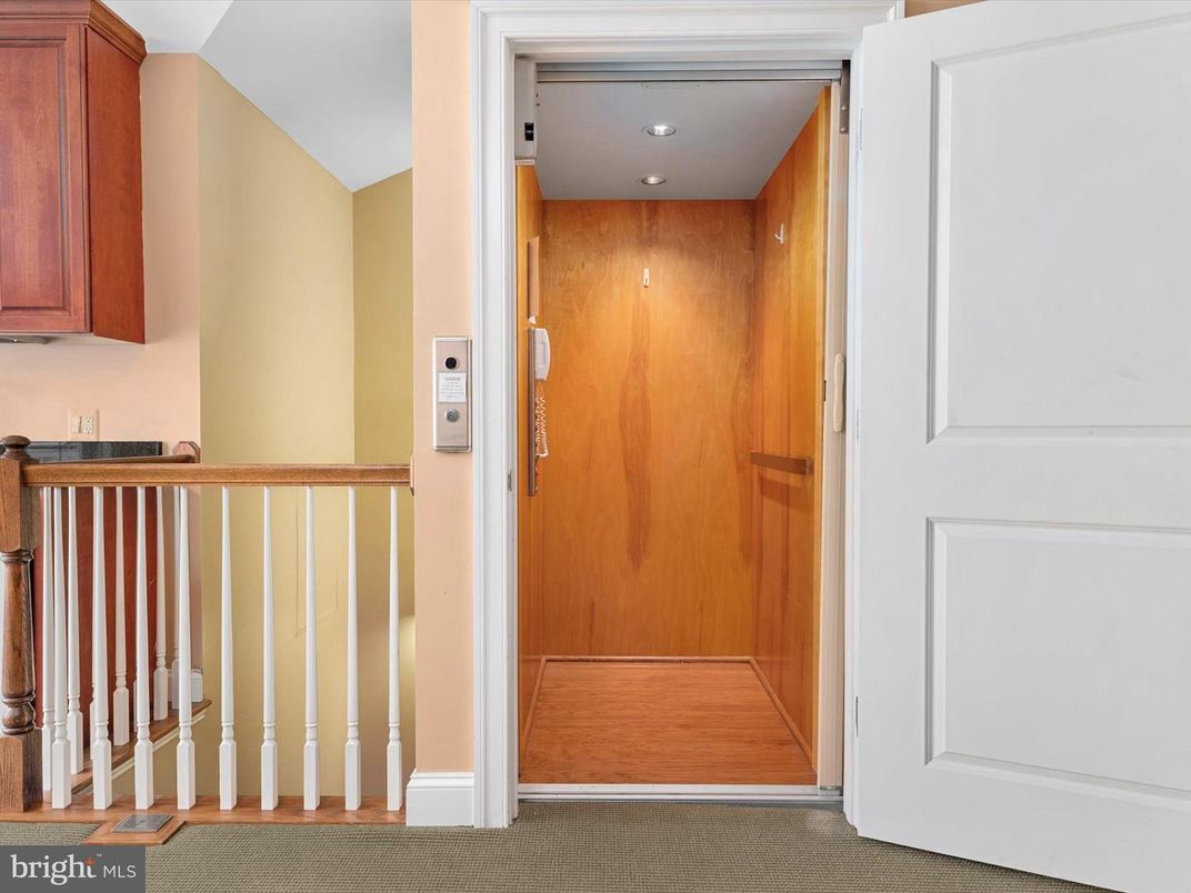Elevator, Interior, Recessed Lighting, Wood Texture Flooring, Wooden Walls