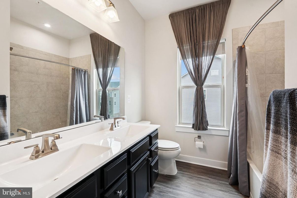 Bathroom, Dual Sink Vanities, Interior, Recessed Lighting, Wood Texture Flooring
