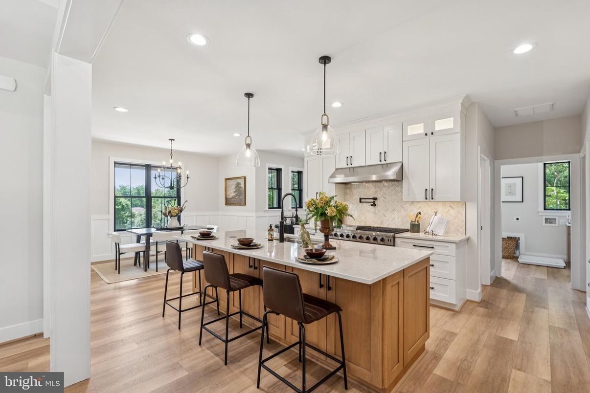 Chandelier, Dining room, Interior, Kitchen, Pendant Lights, Recessed Lighting, Stainless Steel Appliances, Wood Texture Flooring
