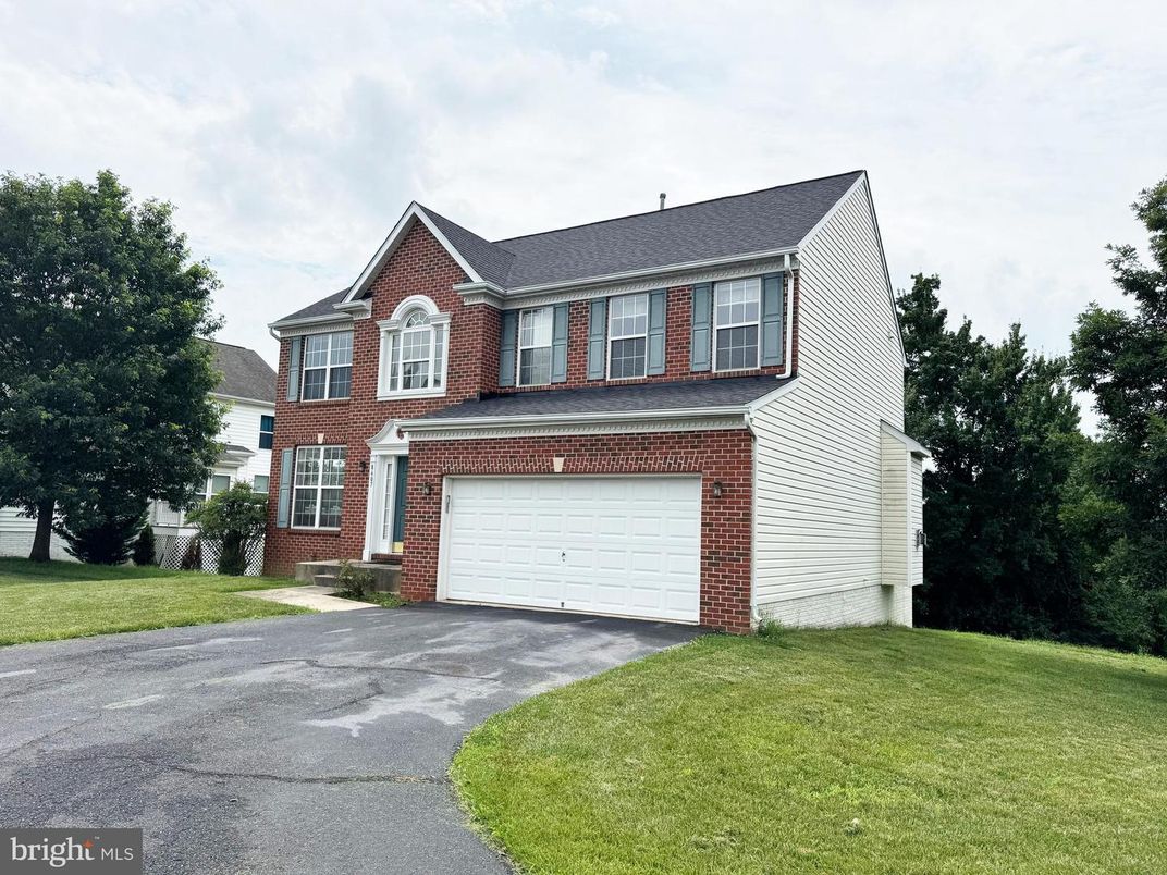 Attached, Exterior, Facade, Brick Facade, Brick Traditional
