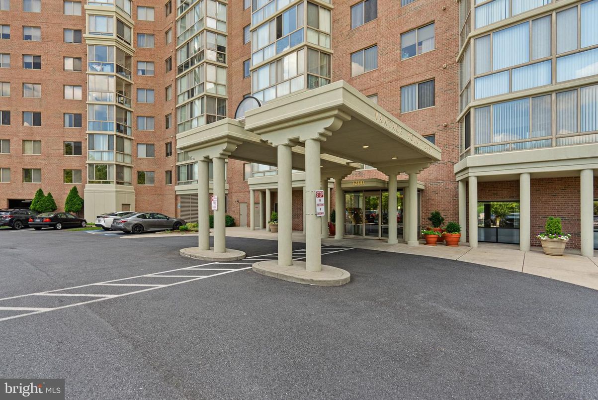 Exterior, Facade, Brick Facade, Condo Building