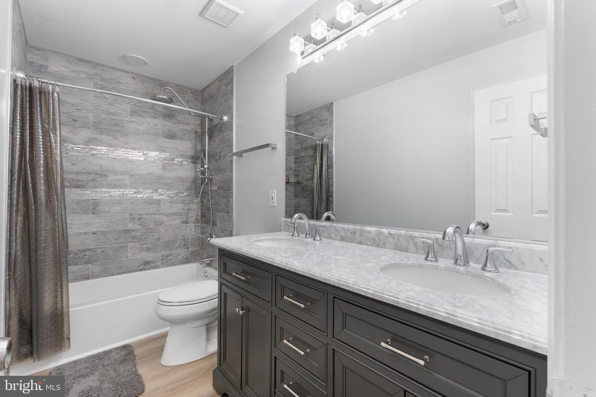 Bathroom, Dual Sink Vanities, Interior, Recessed Lighting, Wood Texture Flooring