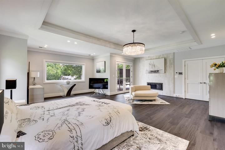 Bedroom, Chandelier, Fireplace, Interior, Recessed Lighting, Wood Texture Flooring