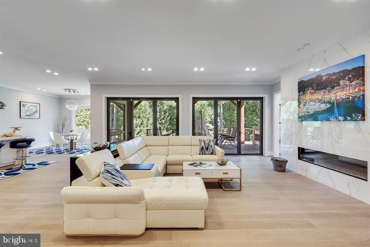 Dining room, Fireplace, Interior, Living room, Marble Walls, Recessed Lighting, Wood Texture Flooring