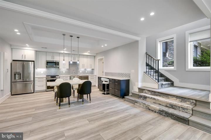 Dining room, Interior, Kitchen, Pendant Lights, Recessed Lighting, Stainless Steel Appliances, Wood Texture Flooring
