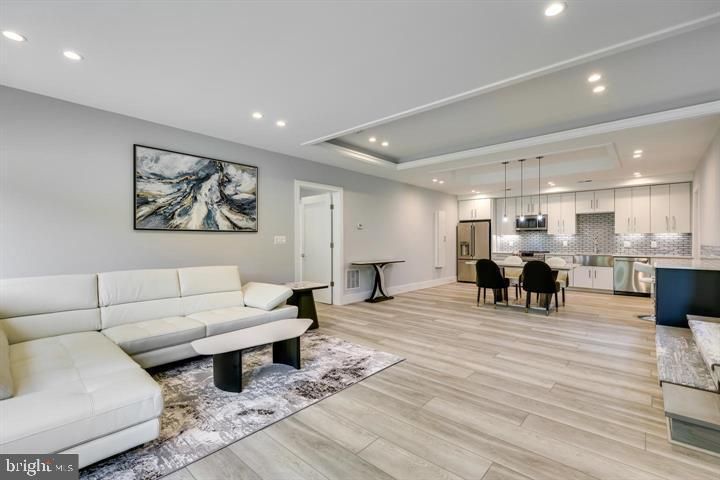 Dining room, Interior, Kitchen, Living room, Pendant Lights, Recessed Lighting, Stainless Steel Appliances, Wood Texture Flooring