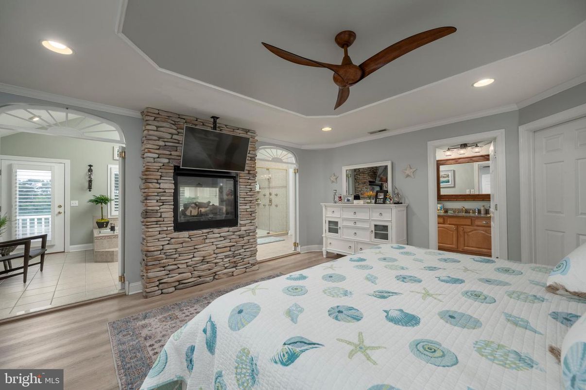 Bedroom, Fireplace, Interior, Recessed Lighting, Wood Texture Flooring
