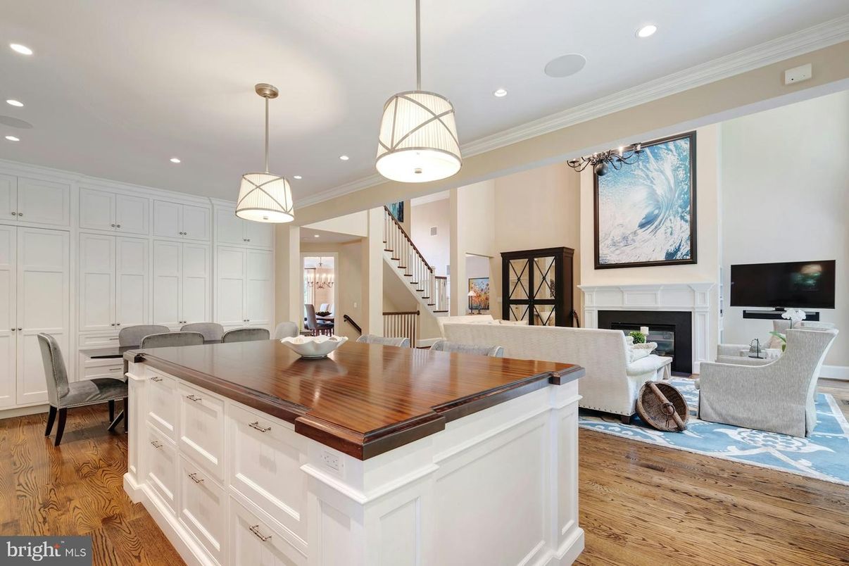 Dining room, Fireplace, Interior, Living room, Pendant Lights, Recessed Lighting, Wood Texture Flooring
