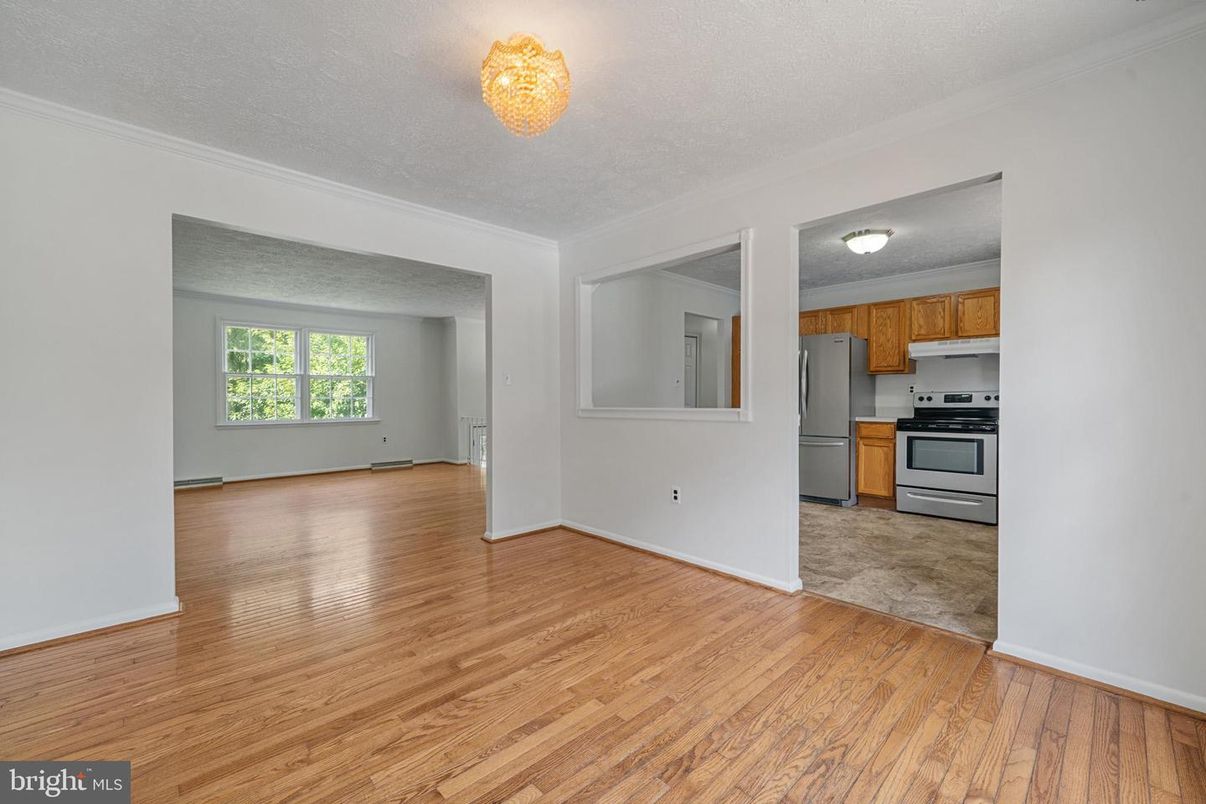Empty room, Interior, Kitchen, Stainless Steel Appliances, Wood Texture Flooring
