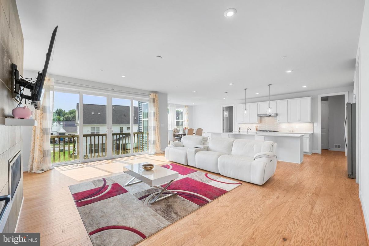 Fireplace, Interior, Kitchen, Living room, Pendant Lights, Recessed Lighting, Wood Texture Flooring