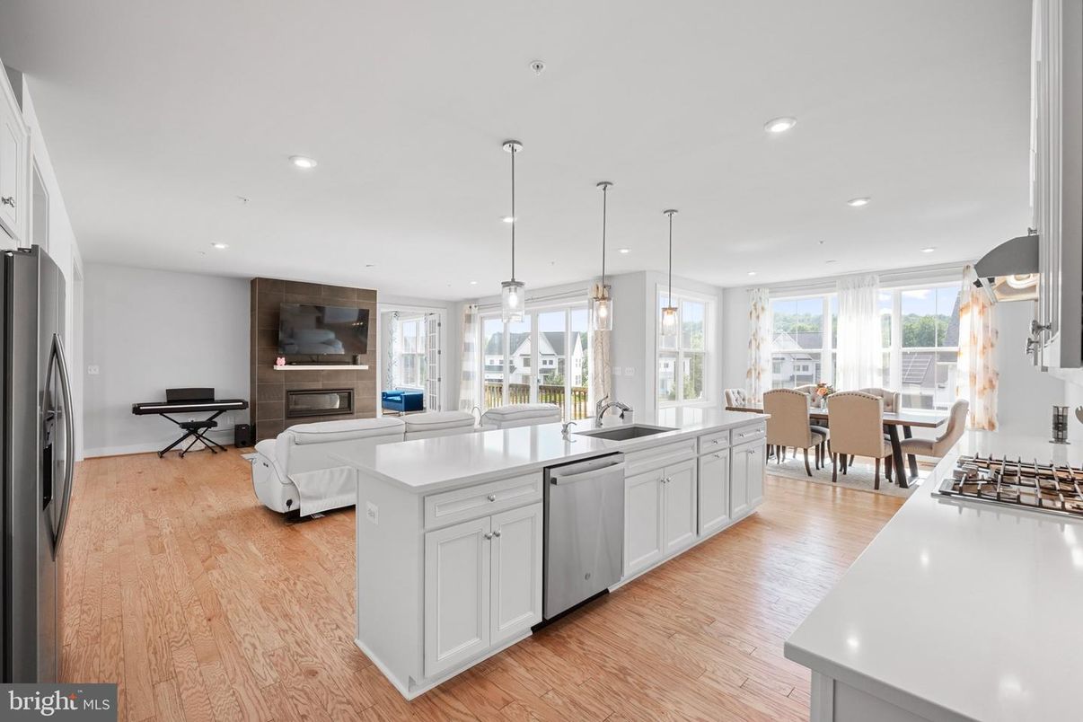 Dining room, Fireplace, Interior, Kitchen, Living room, Pendant Lights, Recessed Lighting, Wood Texture Flooring