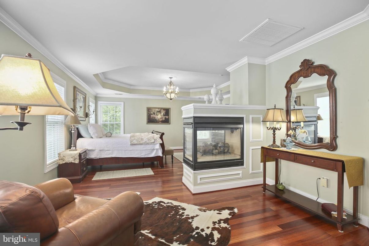 Bedroom, Chandelier, Fireplace, Interior, Wood Texture Flooring