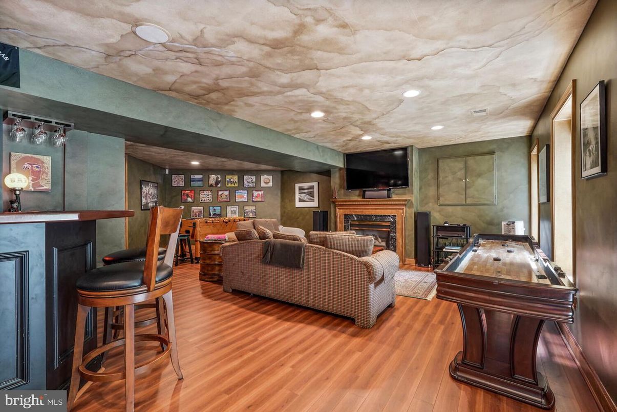 Fireplace, Game Room, Interior, Living room, Recessed Lighting, Wood Texture Flooring