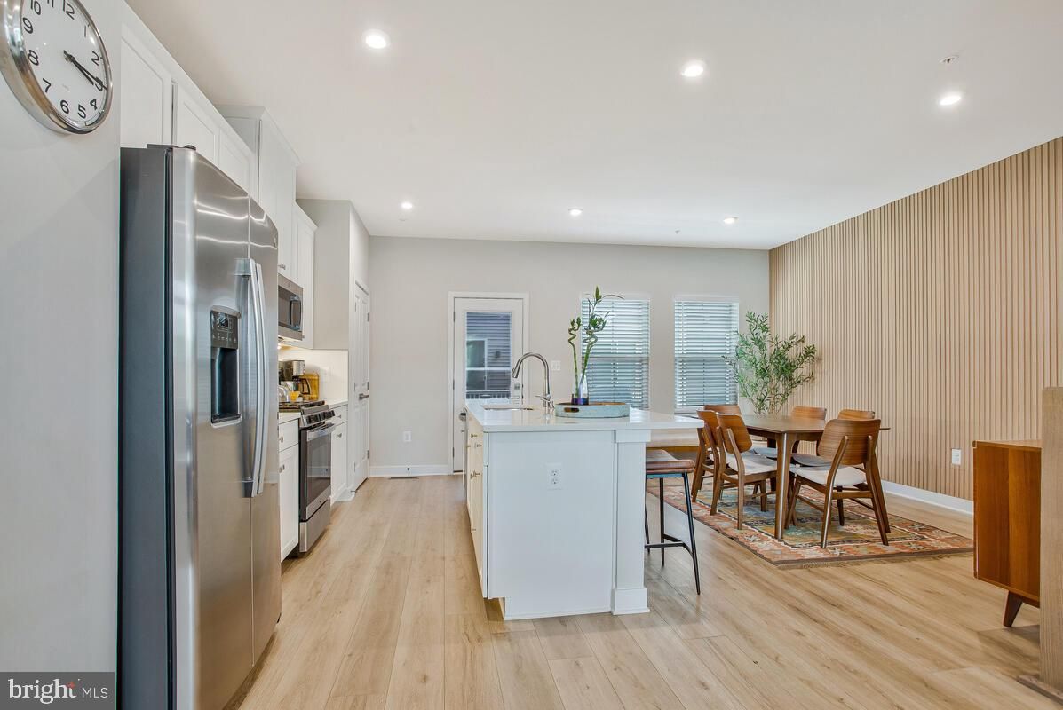 Dining room, Interior, Kitchen, Recessed Lighting, Stainless Steel Appliances, Wood Texture Flooring