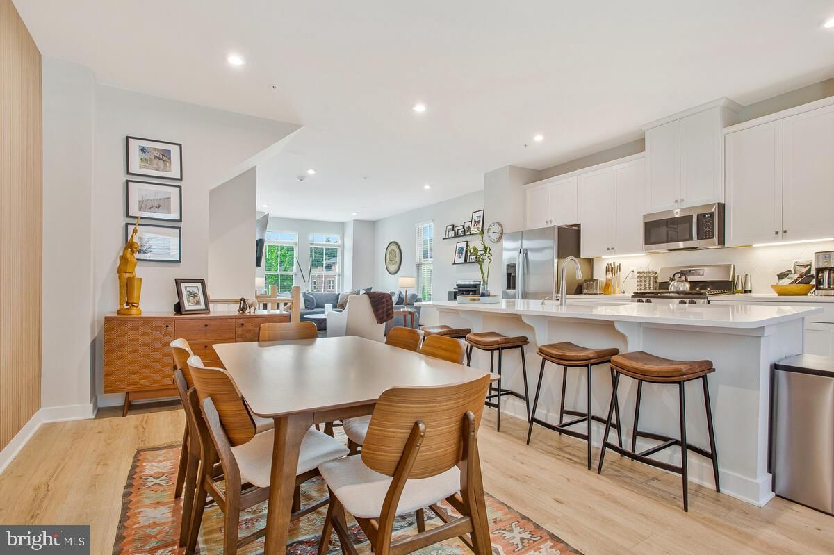 Dining room, Interior, Kitchen, Recessed Lighting, Stainless Steel Appliances, Wood Texture Flooring