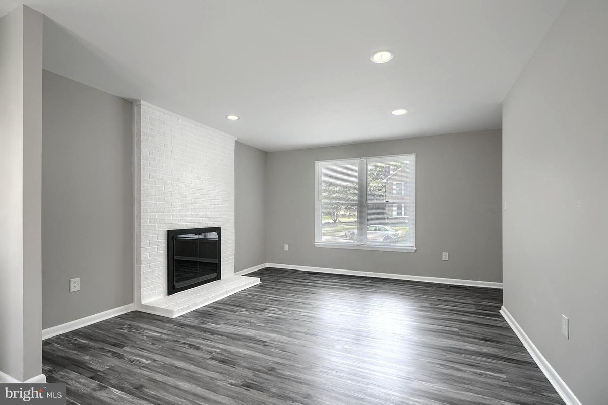 Empty room, Fireplace, Interior, Recessed Lighting, Wood Texture Flooring