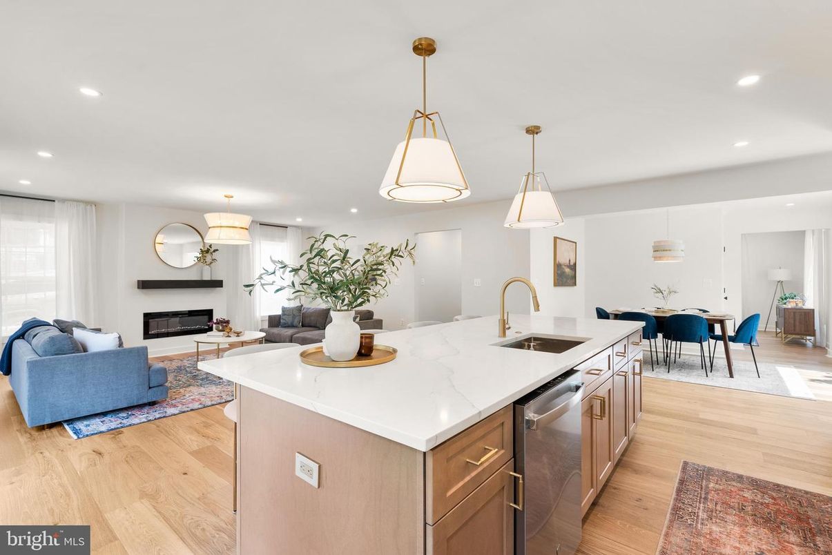 Dining room, Fireplace, Interior, Kitchen, Living room, Pendant Lights, Recessed Lighting, Stainless Steel Appliances, Wood Texture Flooring