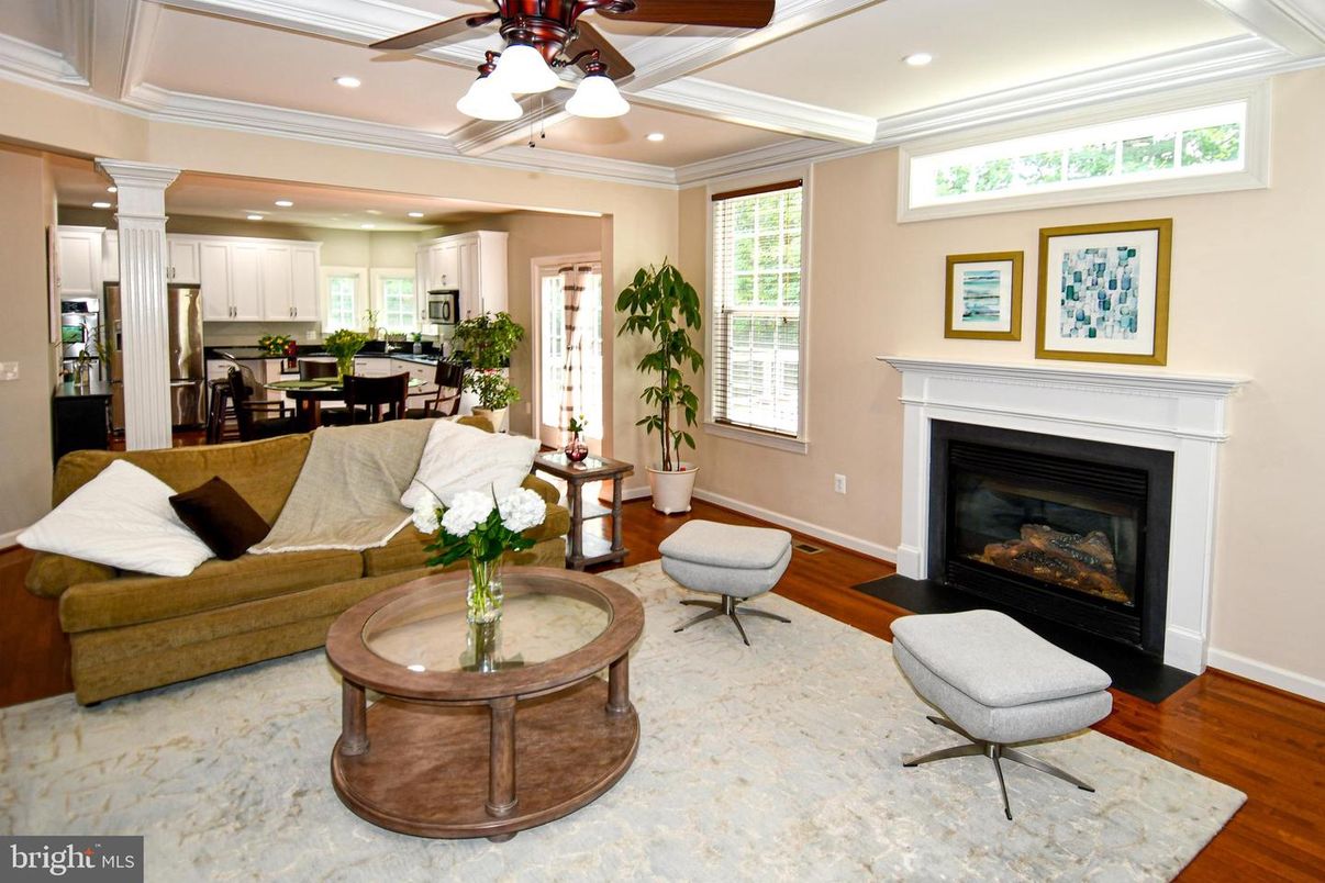 Dining room, Fireplace, Interior, Kitchen, Living room, Recessed Lighting, Wood Texture Flooring
