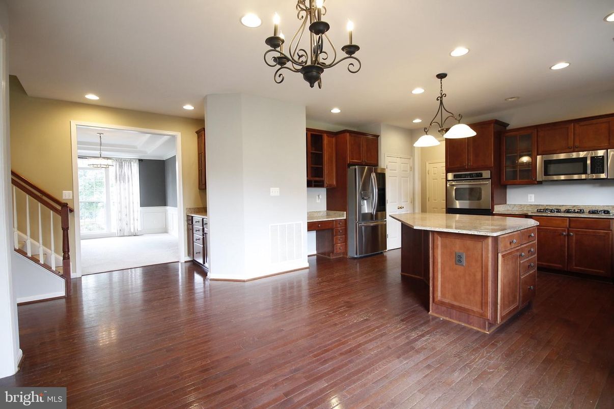 Chandelier, Interior, Kitchen, Pendant Lights, Recessed Lighting, Stainless Steel Appliances, Wood Texture Flooring