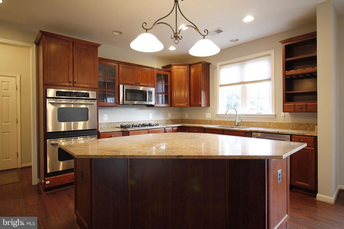 Chandelier, Interior, Kitchen, Pendant Lights, Recessed Lighting, Stainless Steel Appliances, Wood Texture Flooring