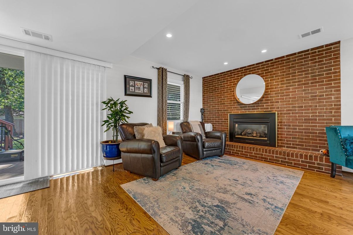 Fireplace, Interior, Recessed Lighting, Stone Walls, Wood Texture Flooring