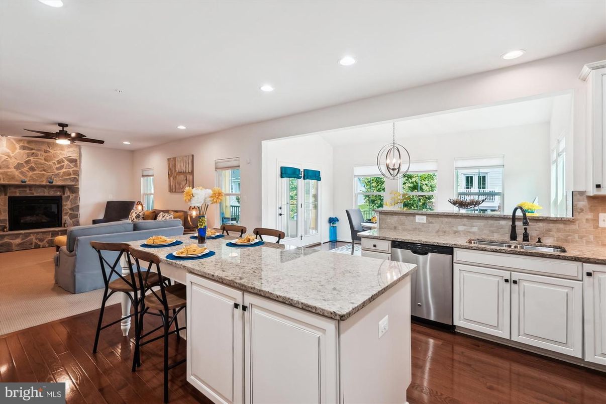 Dining room, Fireplace, Interior, Kitchen, Living room, Pendant Lights, Recessed Lighting, Stone Walls, Wood Texture Flooring