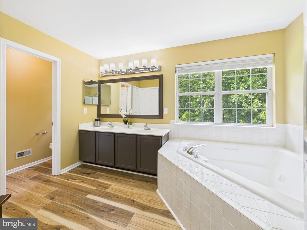 Bathroom, Dual Sink Vanities, Interior, Tile Countertops, Wood Texture Flooring