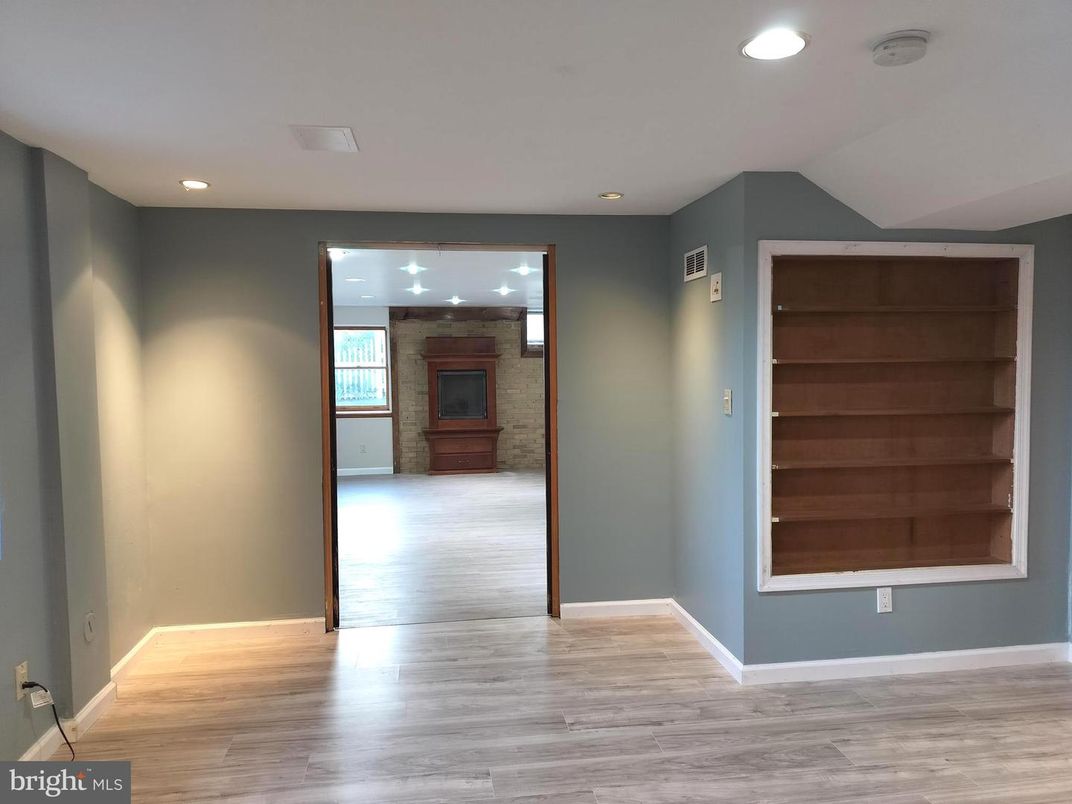 Empty room, Fireplace, Interior, Recessed Lighting, Wood Texture Flooring