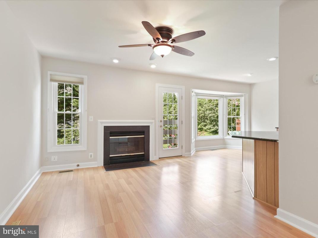 Empty room, Fireplace, Interior, Recessed Lighting, Wood Texture Flooring