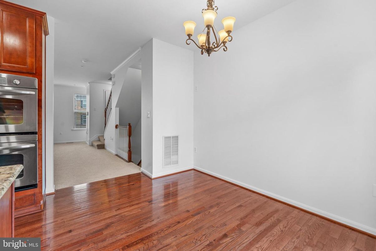 Chandelier, Empty room, Interior, Kitchen, Stainless Steel Appliances, Wood Texture Flooring
