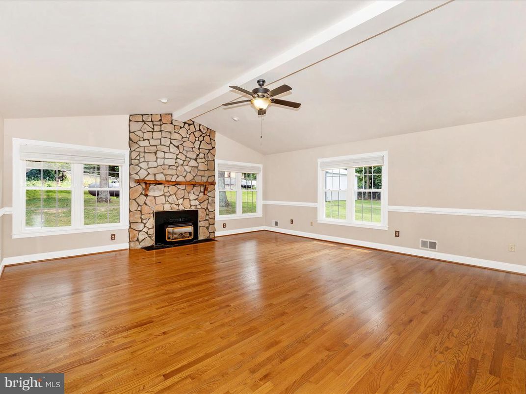 Empty room, Fireplace, Interior, Stone Walls, Wood Texture Flooring