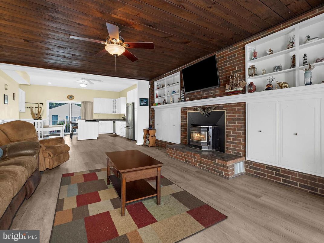 Fireplace, Interior, Kitchen, Recessed Lighting, Stone Walls, Wooden Ceilings, Wood Texture Flooring