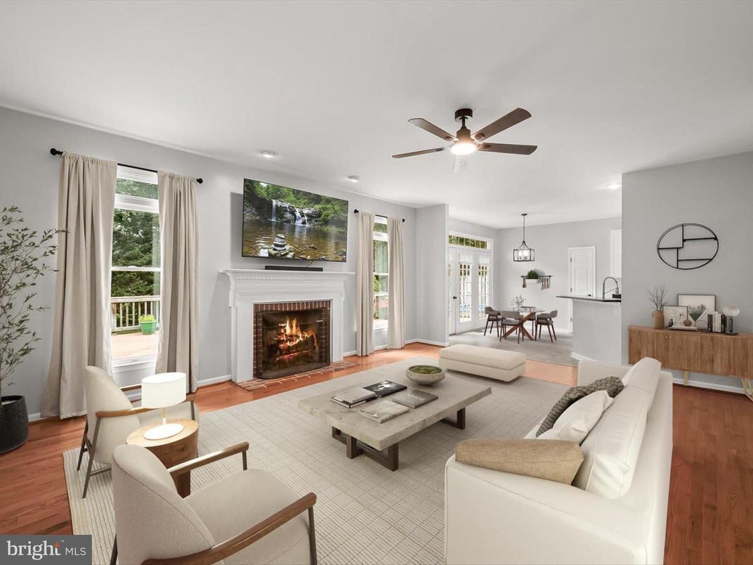 Dining room, Fireplace, Interior, Living room, Pendant Lights, Recessed Lighting, Wood Texture Flooring