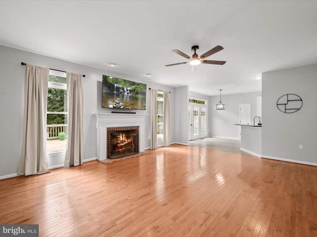 Empty room, Fireplace, Interior, Pendant Lights, Recessed Lighting, Wood Texture Flooring