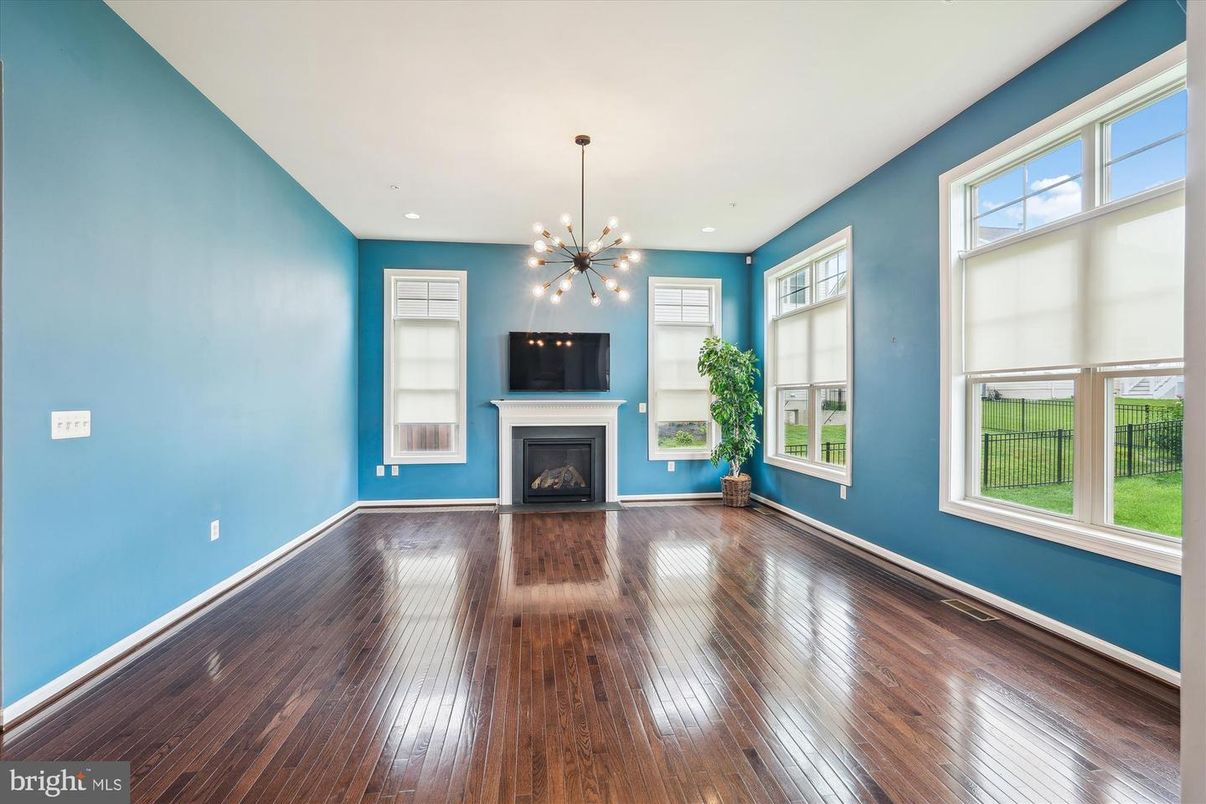 Empty room, Fireplace, Interior, Pendant Lights, Recessed Lighting, Wood Texture Flooring