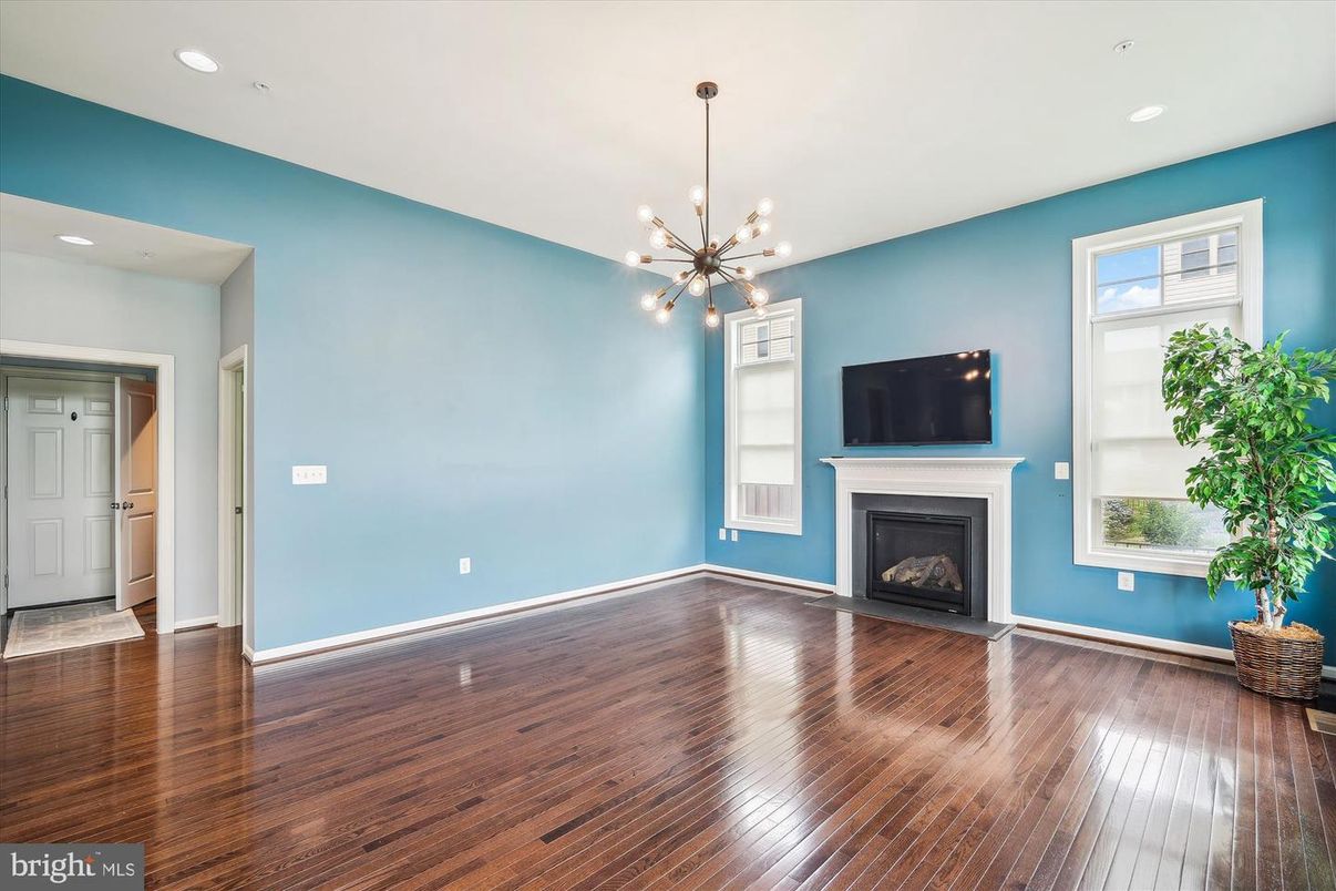 Empty room, Fireplace, Interior, Pendant Lights, Recessed Lighting, Wood Texture Flooring