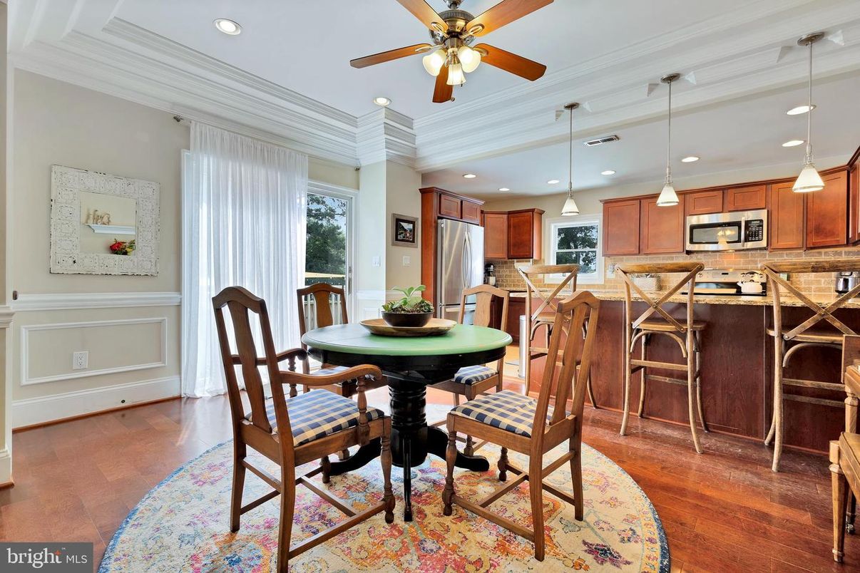 Dining room, Interior, Kitchen, Pendant Lights, Recessed Lighting, Stainless Steel Appliances, Wood Texture Flooring