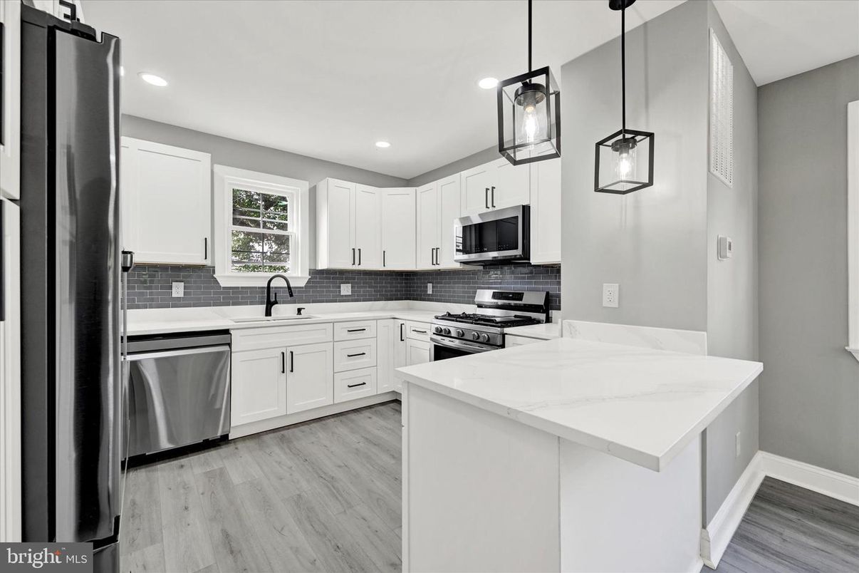 Interior, Kitchen, Pendant Lights, Recessed Lighting, Stainless Steel Appliances, Wood Texture Flooring