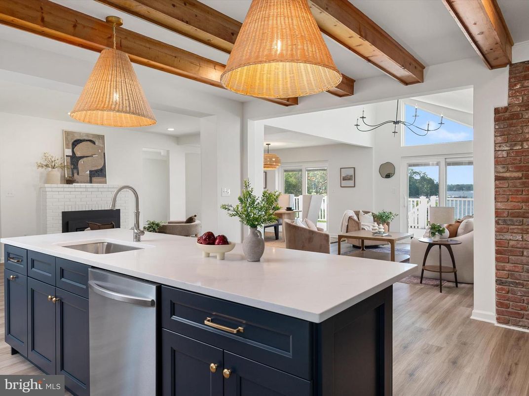 Dining room, Fireplace, Interior, Kitchen, Pendant Lights, Recessed Lighting, Stainless Steel Appliances, Stone Walls, Wooden Beams, Wood Texture Flooring