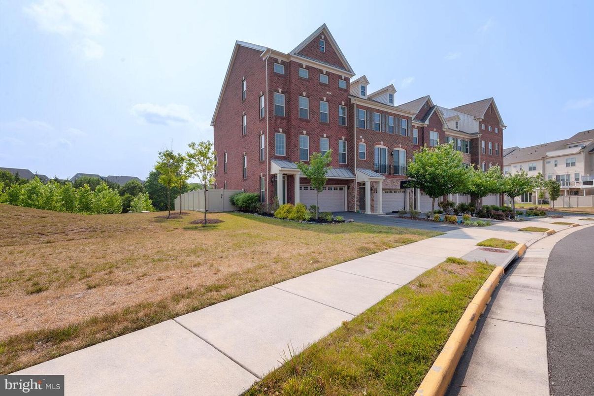 Backyard, Exterior, Facade, Brick Facade, Condo Building