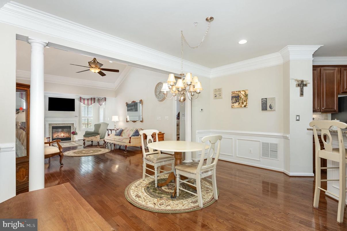 Chandelier, Dining room, Fireplace, Interior, Living room, Recessed Lighting, Wood Texture Flooring