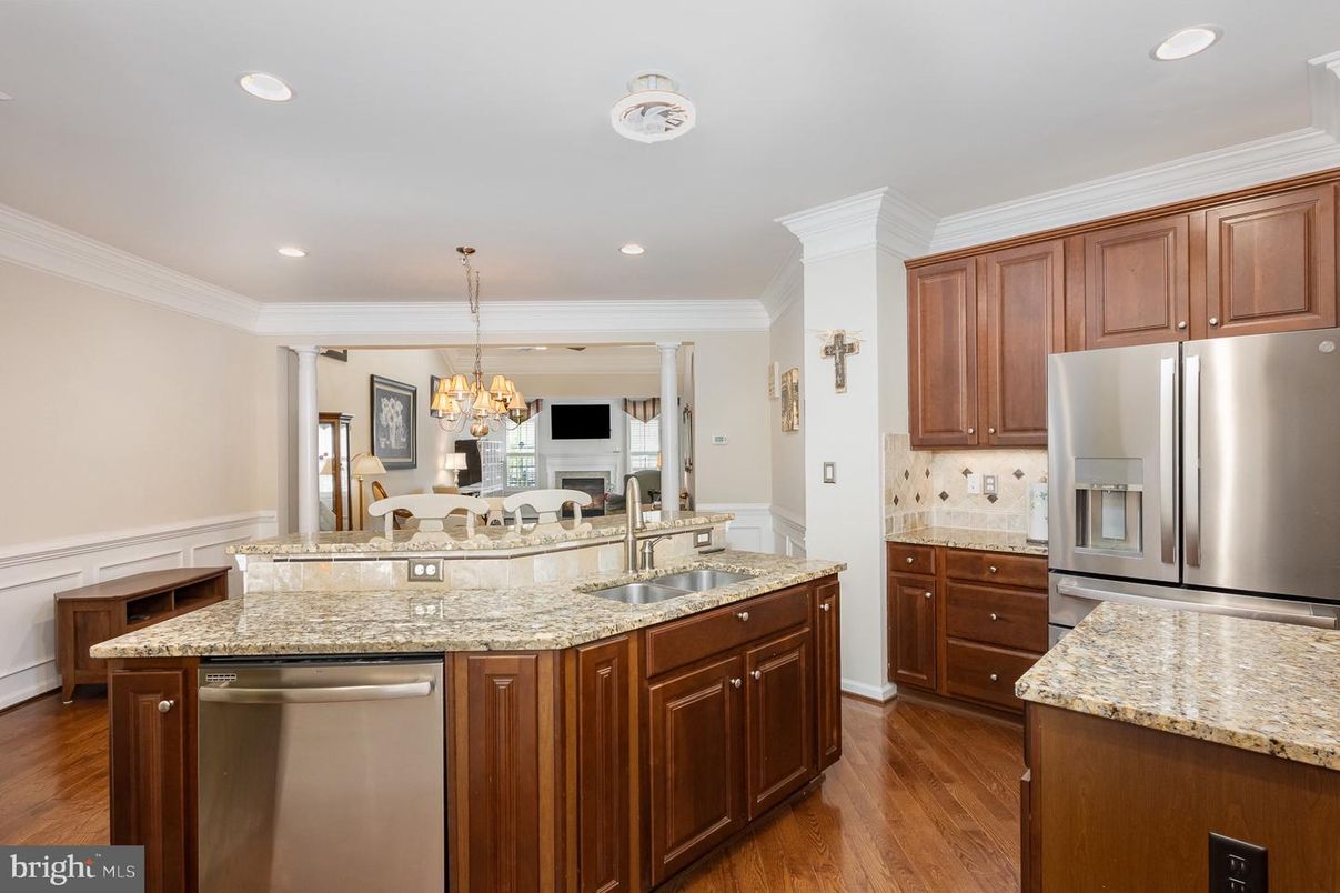 Chandelier, Dining room, Interior, Kitchen, Recessed Lighting, Stainless Steel Appliances, Wood Texture Flooring