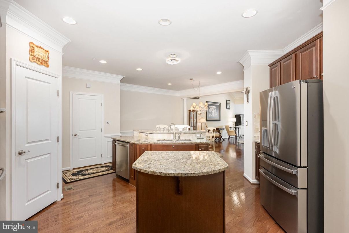 Chandelier, Dining room, Interior, Kitchen, Pendant Lights, Recessed Lighting, Stainless Steel Appliances, Wood Texture Flooring