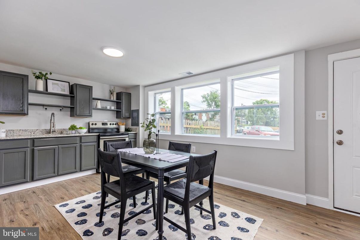 Dining room, Interior, Kitchen, Recessed Lighting, Stainless Steel Appliances, Wood Texture Flooring