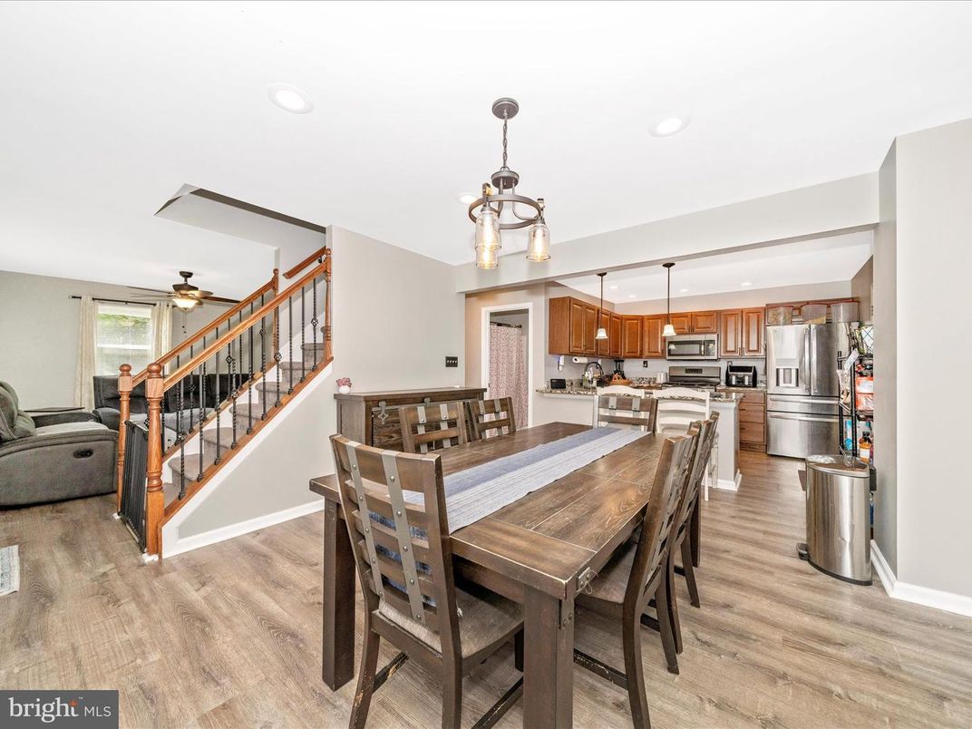 Dining room, Interior, Kitchen, Pendant Lights, Recessed Lighting, Stainless Steel Appliances, Wood Texture Flooring