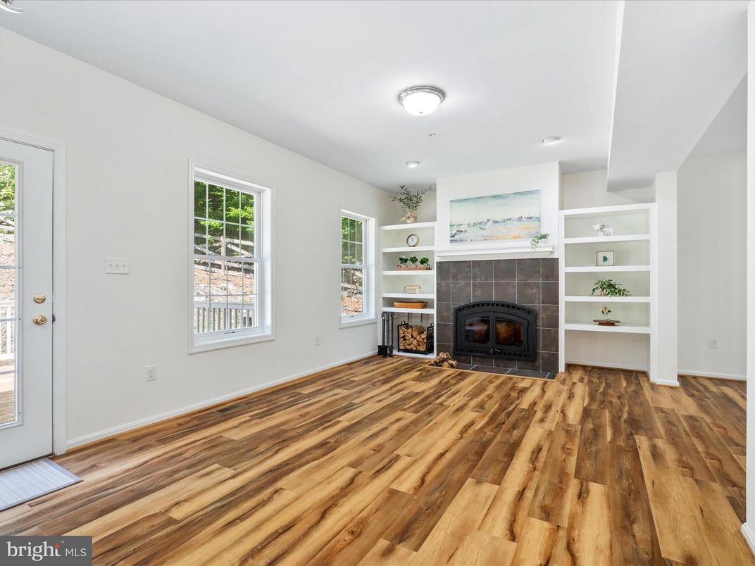 Empty room, Fireplace, Interior, Recessed Lighting, Wood Texture Flooring