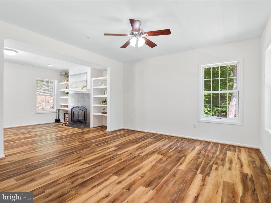 Empty room, Fireplace, Interior, Recessed Lighting, Wood Texture Flooring