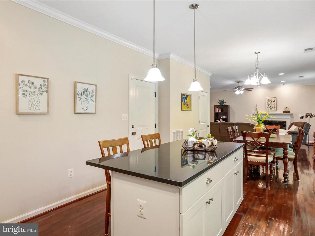 Dining room, Fireplace, Interior, Pendant Lights, Recessed Lighting, Wood Texture Flooring