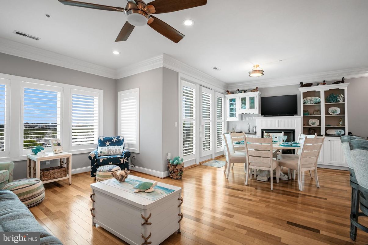 Dining room, Fireplace, Interior, Living room, Recessed Lighting, Wood Texture Flooring