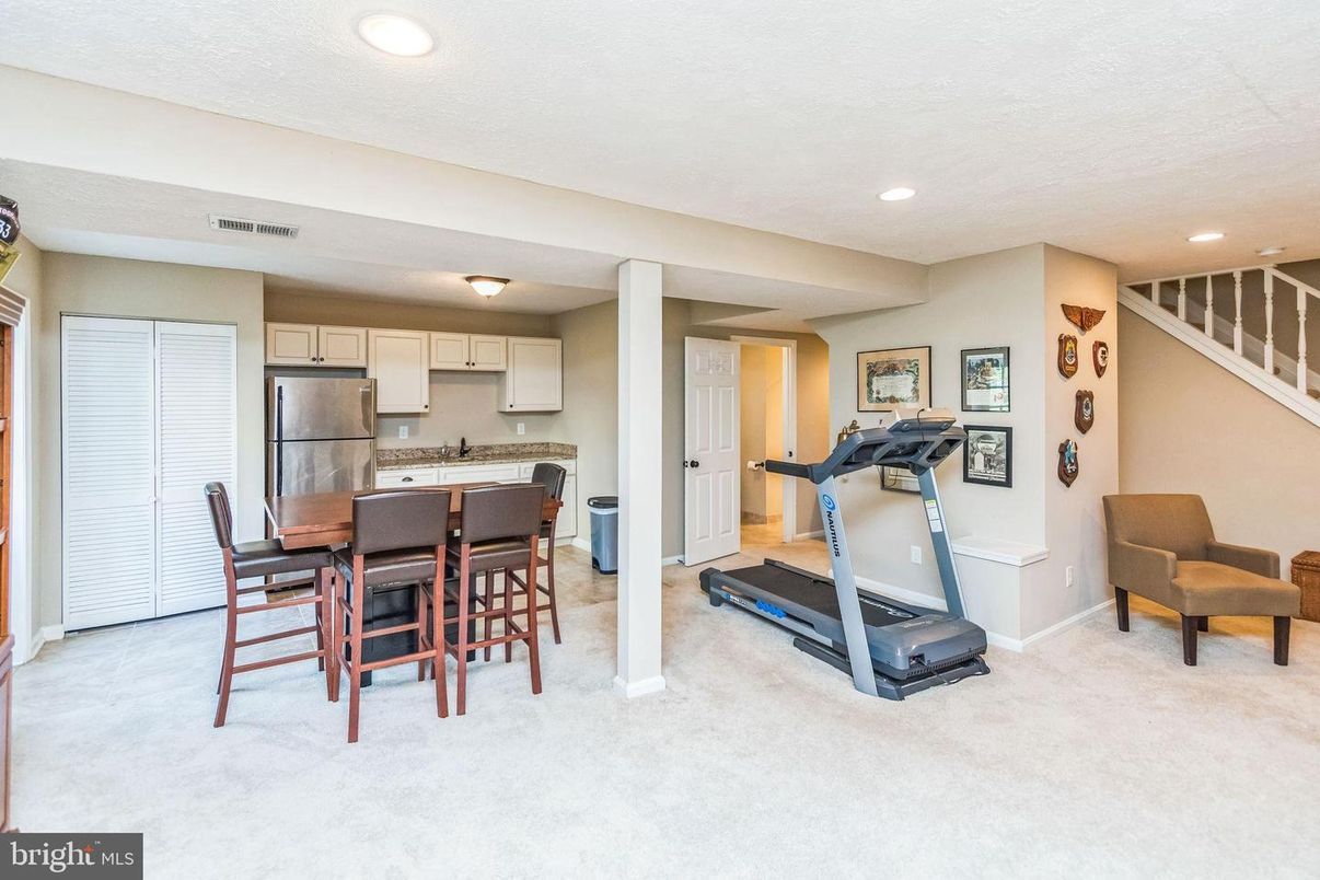Dining room, Fitness Equipment, Interior, Kitchen, Recessed Lighting, Stainless Steel Appliances